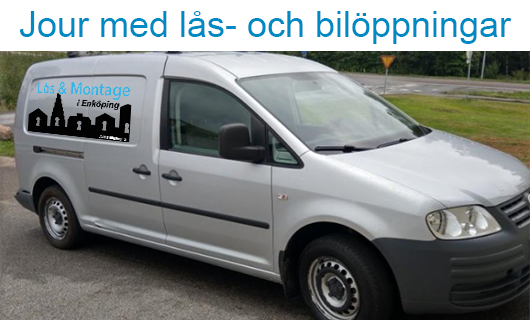 En silverfärgad skåpbil med logotyp för lås- och bilöppningar, parkerad vid en väg.